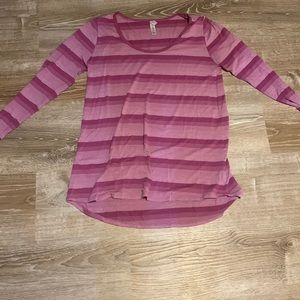 Lularoe women’s size large purple striped shirt